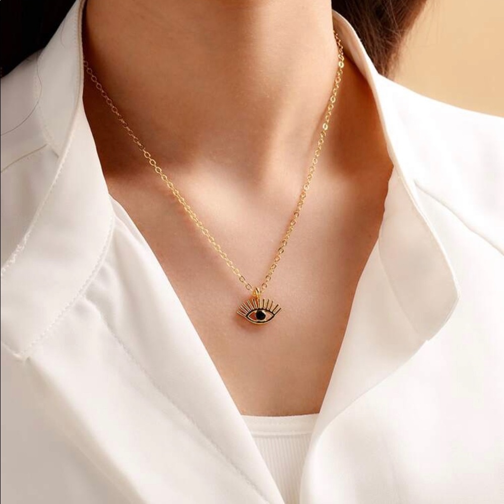 Gold evil eye pendant necklace